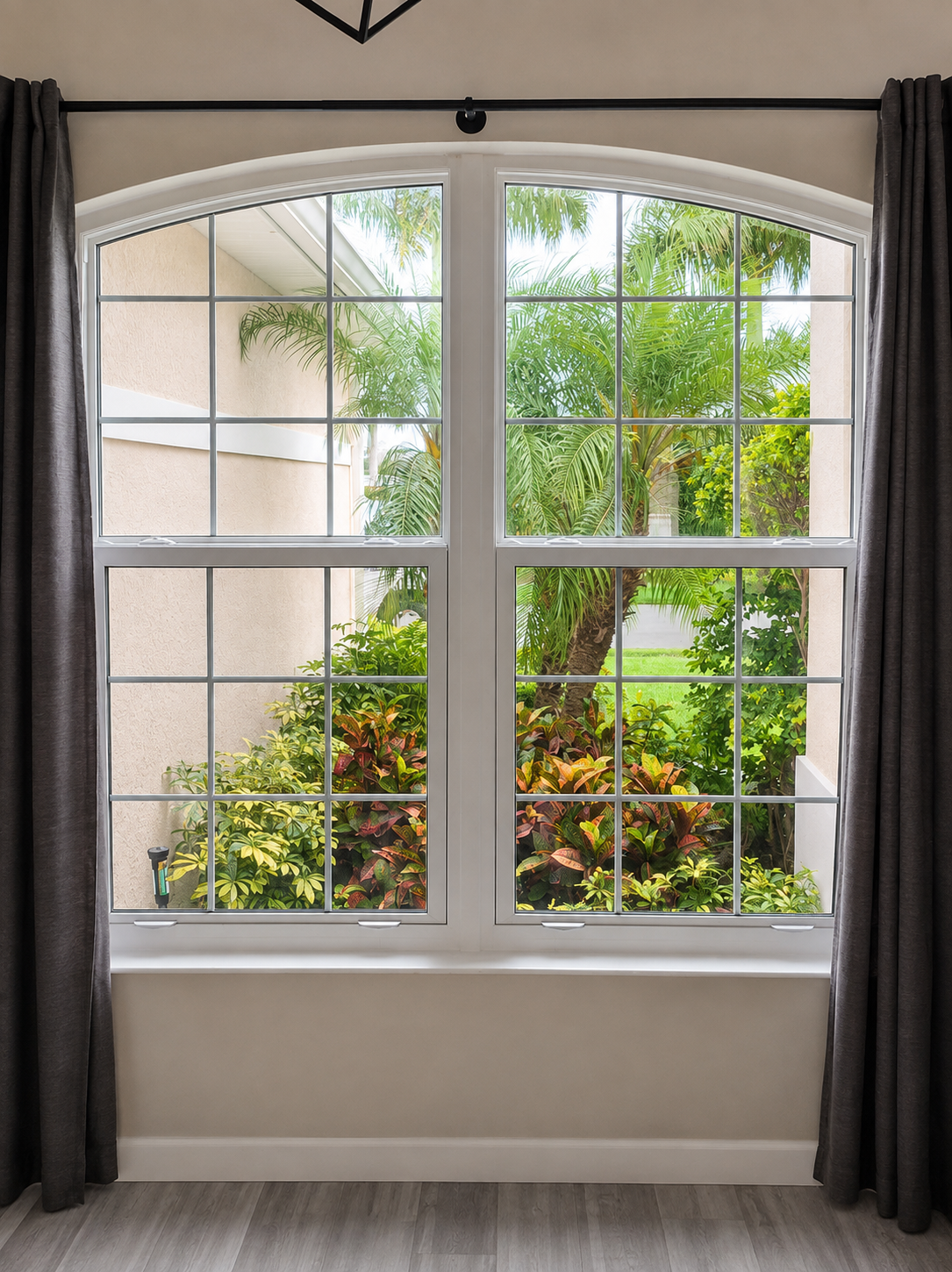Finished arched impact windows