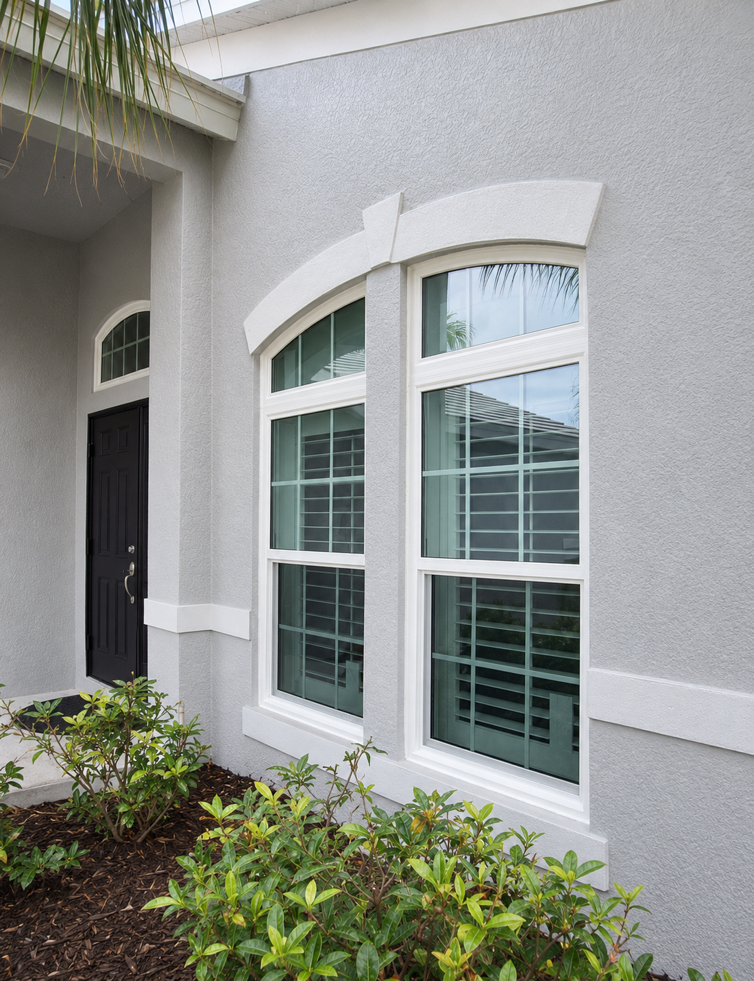 Two tall impact windows with arched tops
